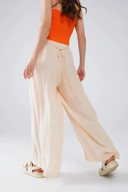 Beige Palazzo Style Pants with Side Pockets and Thick Waist Band