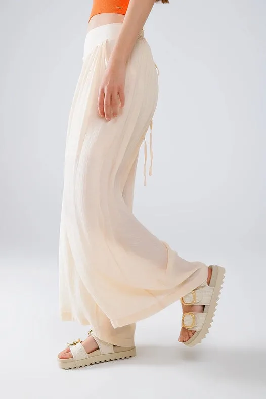 Beige Palazzo Style Pants with Side Pockets and Thick Waist Band